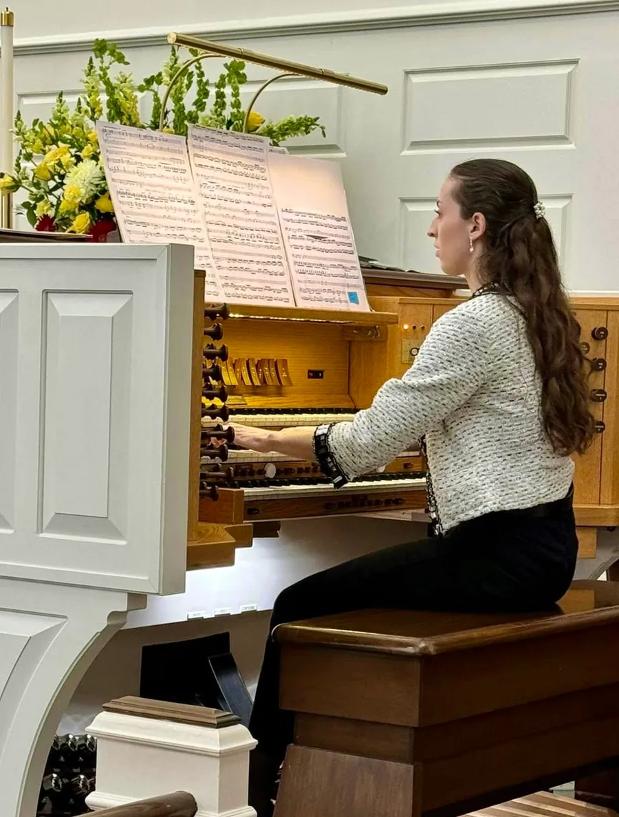 Ariana at the organ console