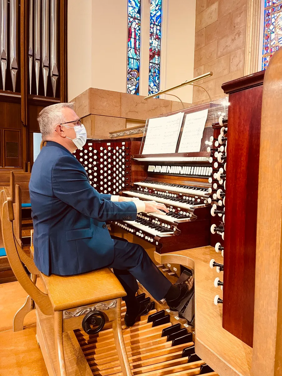 Thompson at the console of Westwood United Methodist Church in Los Angeles